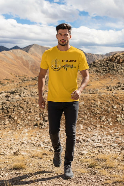 Man wearing a yellow t-shirt with a graphic design in a desert landscape