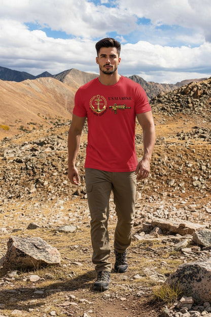 Man wearing a red t-shirt with a logo in a desert landscape