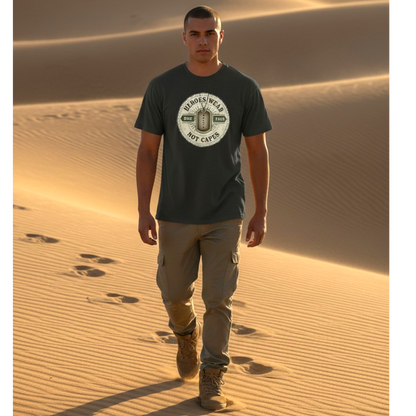 Man walking in the desert wearing a t-shirt with a logo and text.