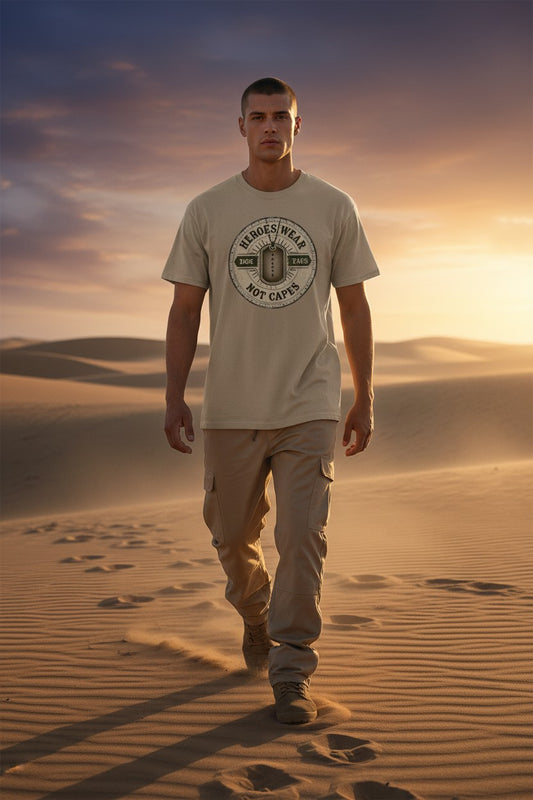 Man walking on sand dunes with a sunset in the background