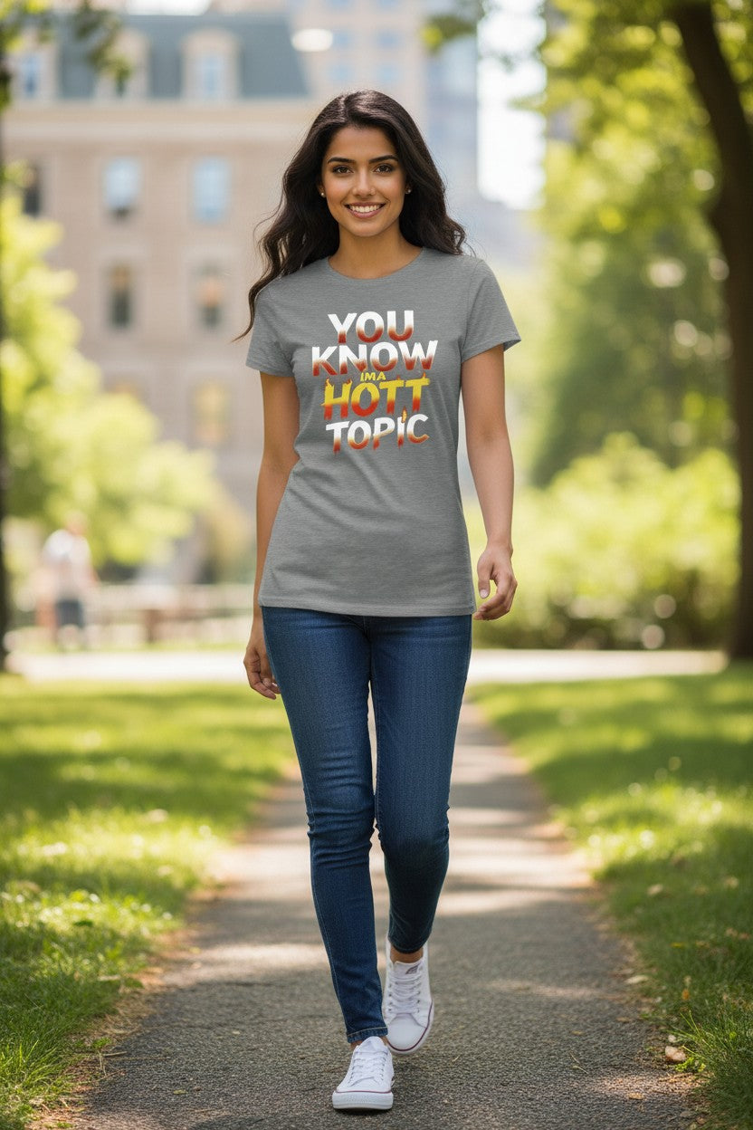 Woman walking outdoors wearing a t-shirt with colorful text