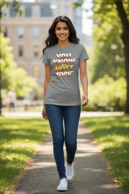 Woman walking outdoors wearing a t-shirt with colorful text