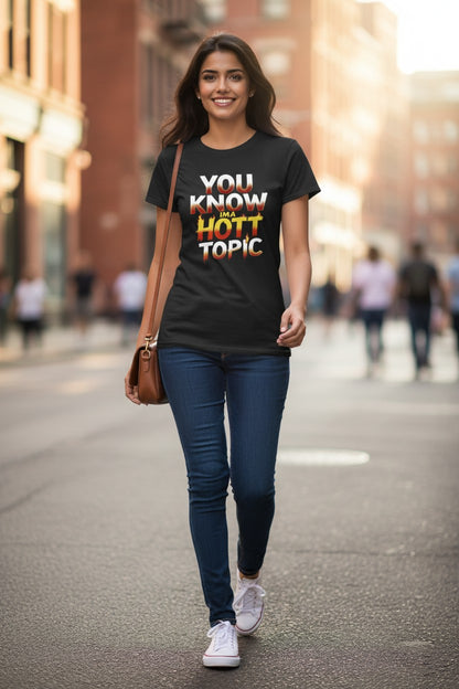 Woman wearing a black t-shirt with colorful text on a city street