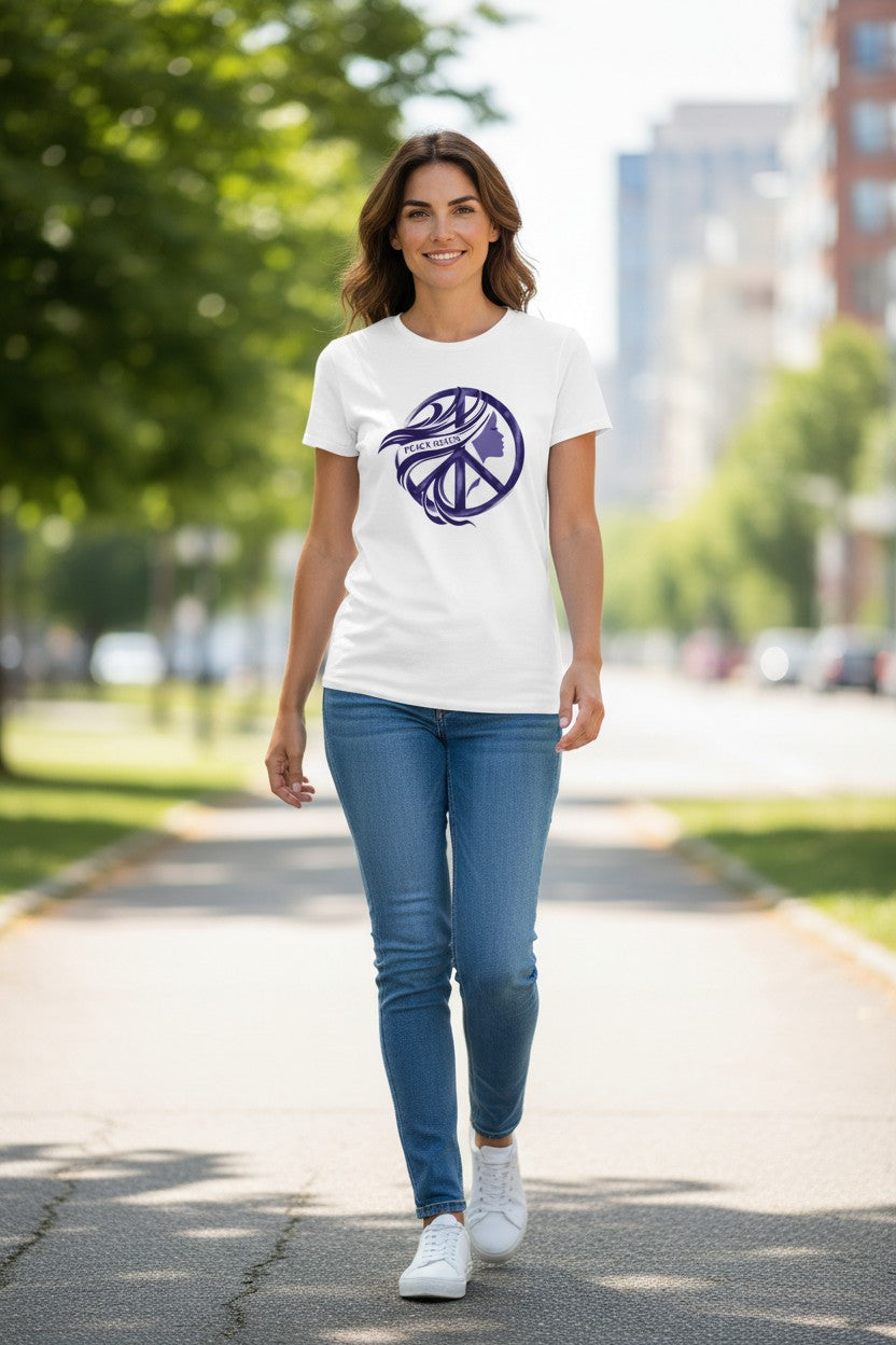 Woman wearing a white t-shirt with a logo on a city street