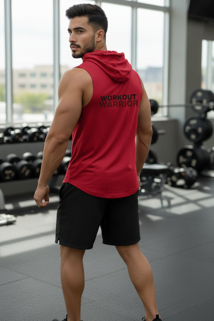 Man wearing a red 'Workout Warrior' tank top in a gym setting