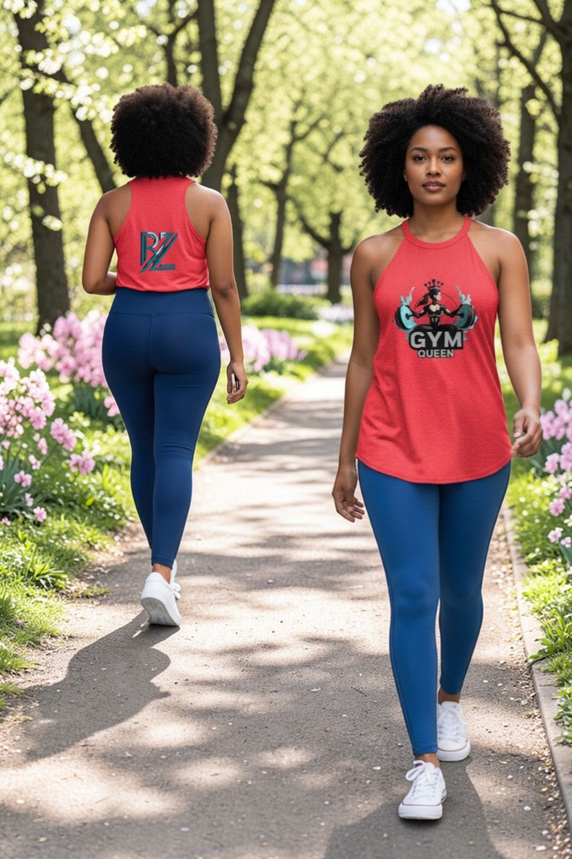Two women walking on a path in a park wearing red 'GYM GIRL' tank tops and blue leggings.
