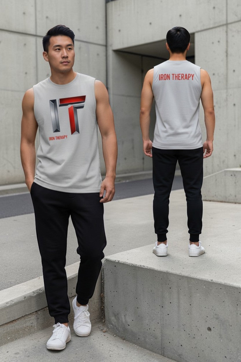 Two men wearing sleeveless shirts with 'IRON THERAPY' logo in an urban setting.