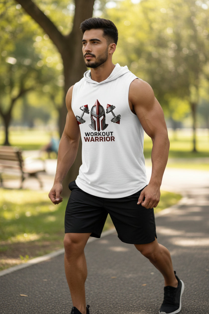 Man wearing a sleeveless hoodie with 'Workout Warrior' text and graphics in a park.